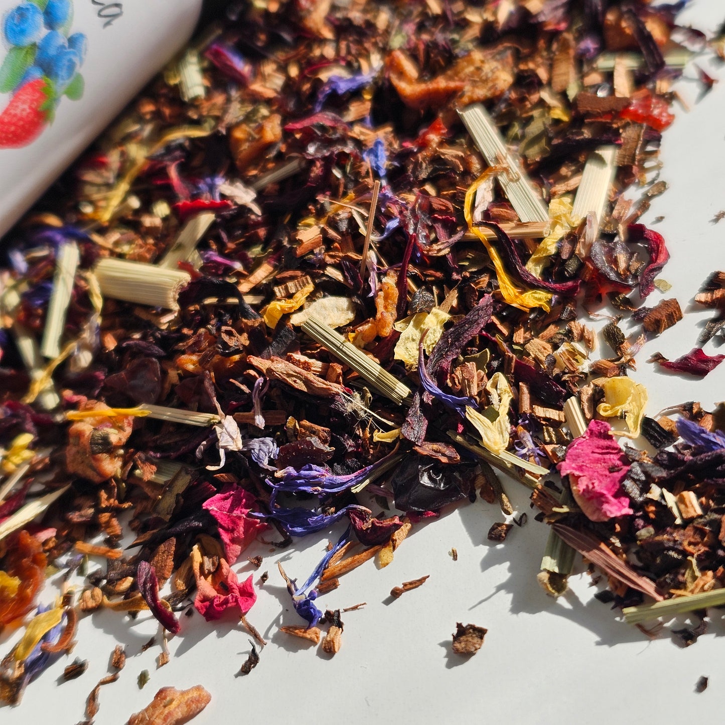 Summer Berry Compote Tea. Loose leaf tea made with Honeybush Tea, berries, hibiscus, rosehips, vanilla--Caffeine Free