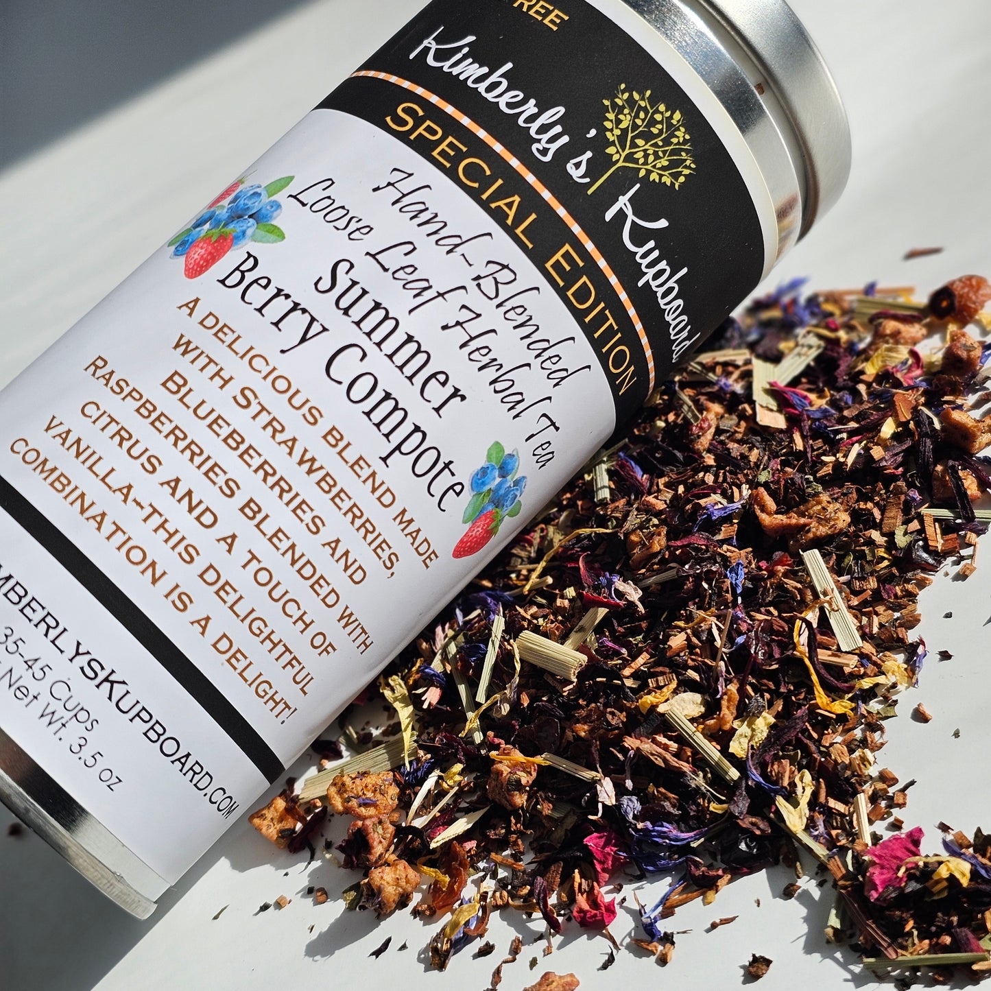 Summer Berry Compote Tea. Loose leaf tea made with Honeybush Tea, berries, hibiscus, rosehips, vanilla--Caffeine Free