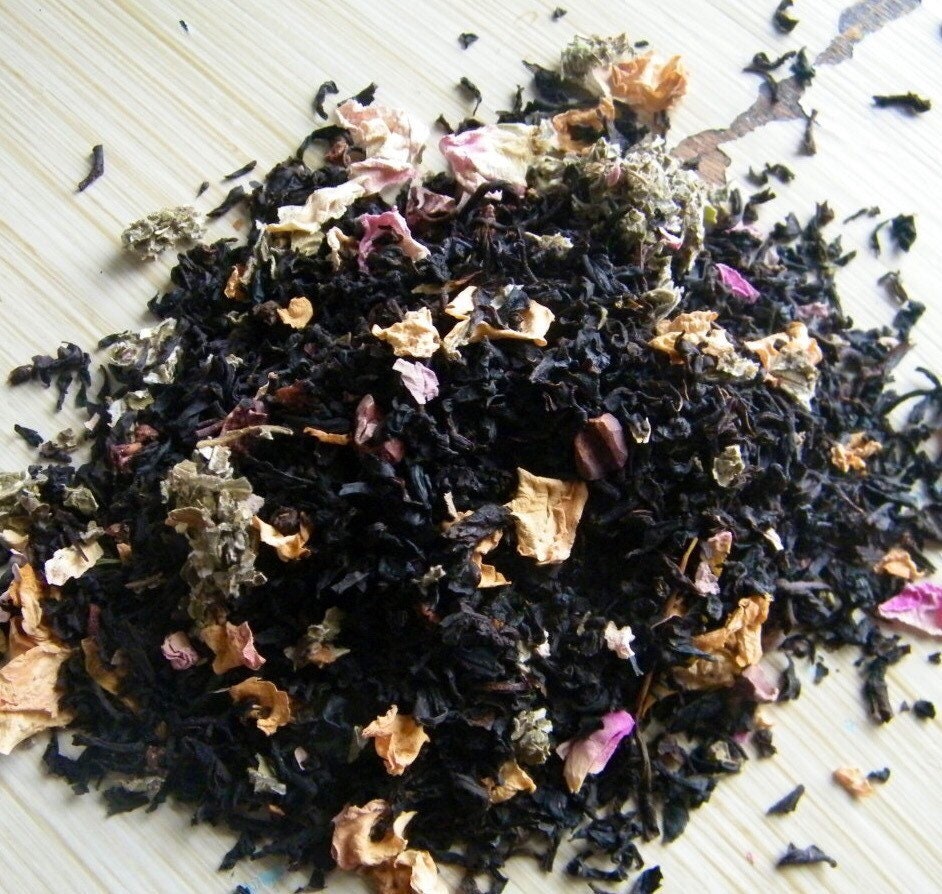 Sweet Raspberry Truffle flavored Loose Leaf  tea  made with black tea, cocoa nibs, sweet raspberries and chocolate chips